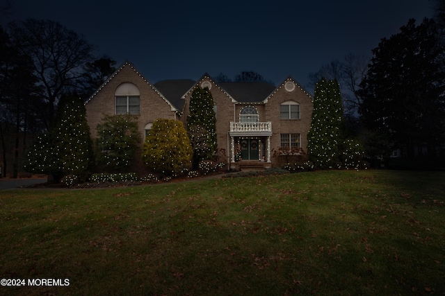 view of property with a lawn