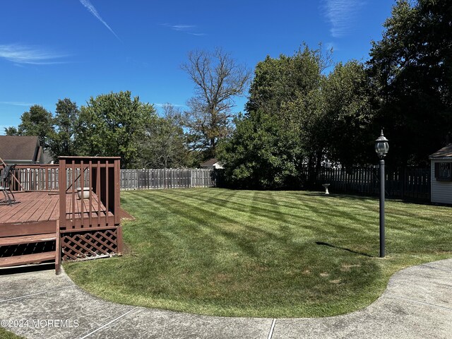 view of yard featuring a deck