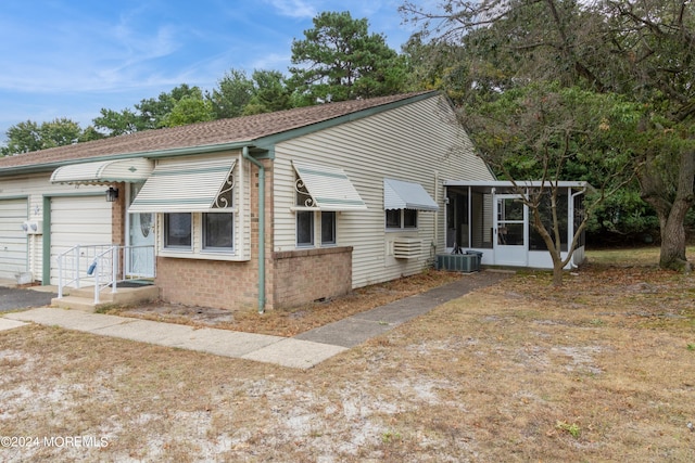 view of front of property with cooling unit