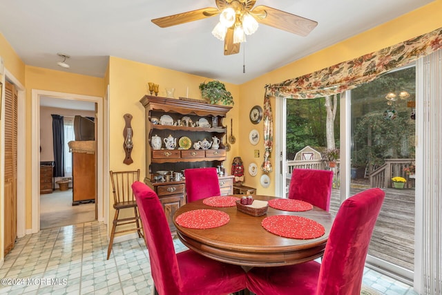 dining room featuring ceiling fan