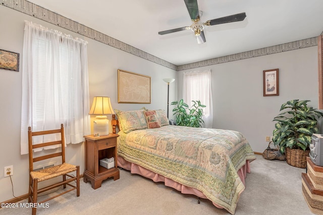 bedroom with carpet and ceiling fan