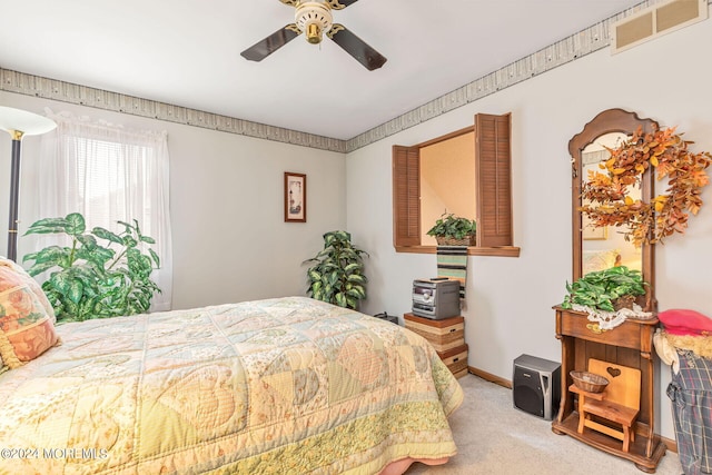 bedroom featuring carpet and ceiling fan