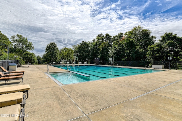 view of swimming pool featuring a patio