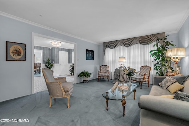 living room featuring carpet floors, ornamental molding, and a chandelier