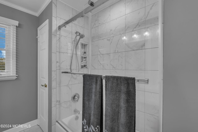 bathroom featuring combined bath / shower with glass door and ornamental molding