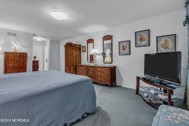 bedroom with light carpet