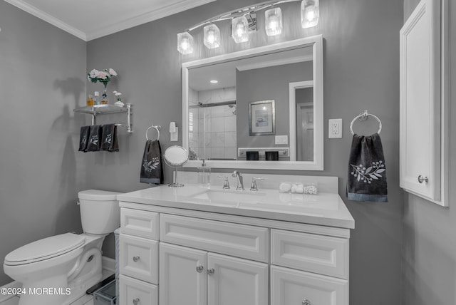 bathroom with walk in shower, ornamental molding, vanity, and toilet