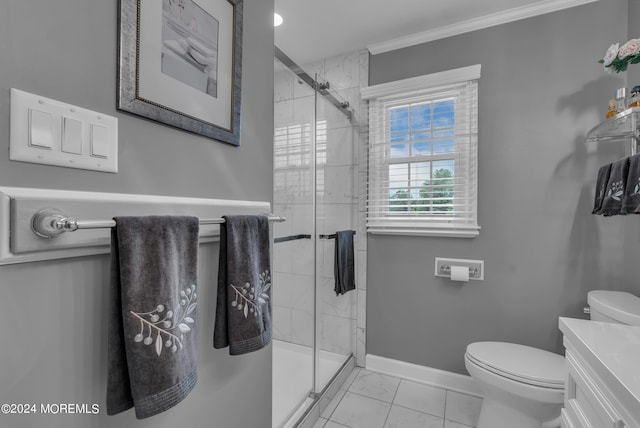 bathroom with vanity, toilet, an enclosed shower, crown molding, and tile patterned flooring