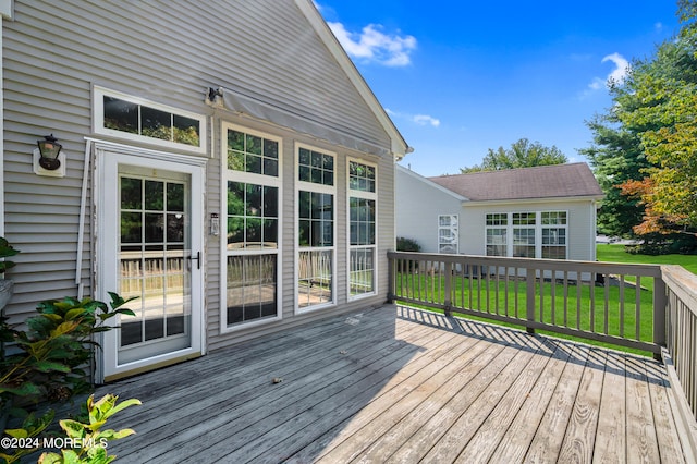 deck featuring a yard