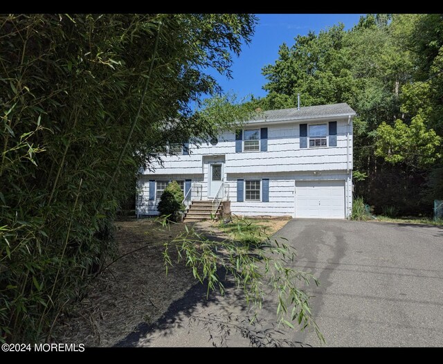 raised ranch with a garage