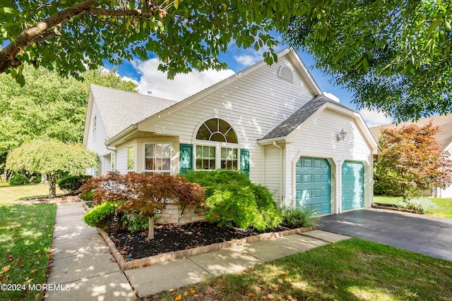 front of property with a garage