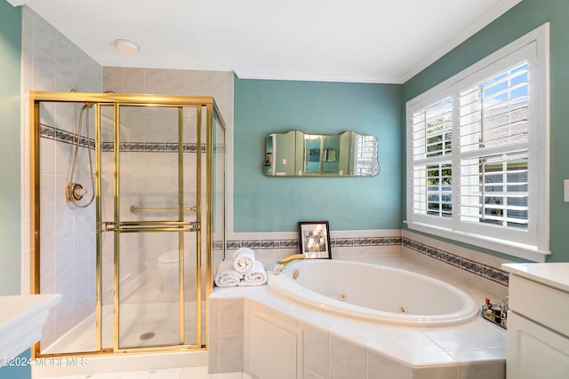 bathroom with vanity, crown molding, and independent shower and bath