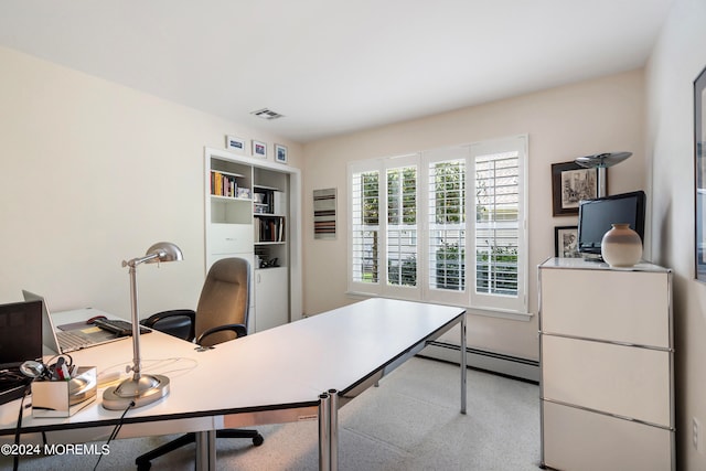 office area with baseboard heating