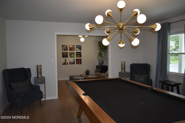 playroom with wood-type flooring, billiards, and a notable chandelier