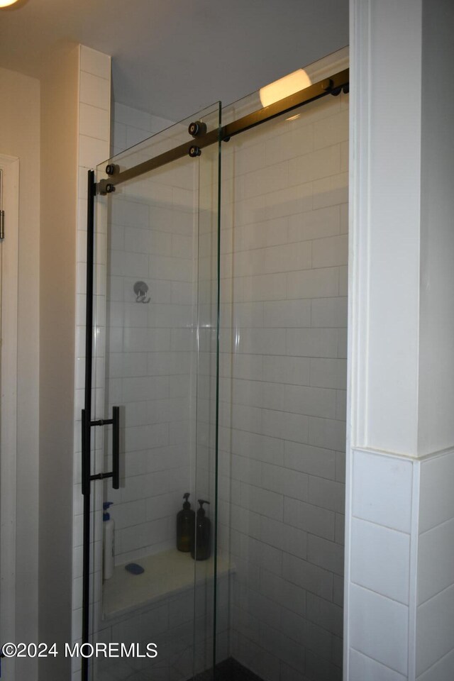 bathroom with an enclosed shower