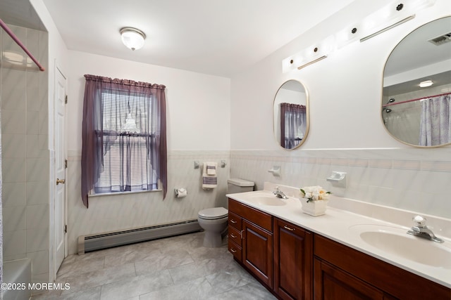 full bath with tile walls, visible vents, a baseboard heating unit, and a sink