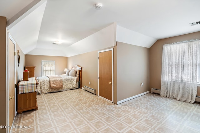 bedroom featuring lofted ceiling, baseboards, visible vents, and baseboard heating