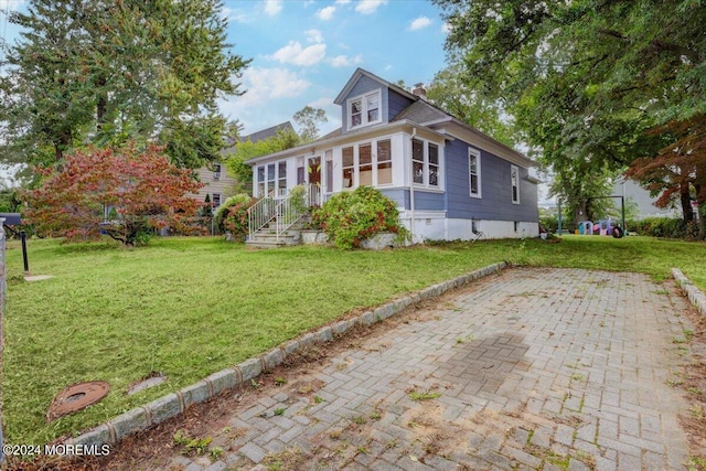 view of home's exterior featuring a lawn