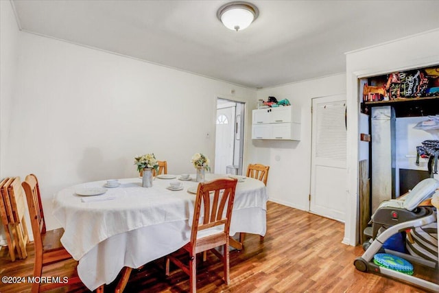 dining area featuring light hardwood / wood-style flooring