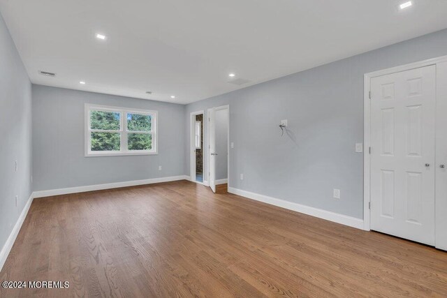 empty room with light wood-type flooring