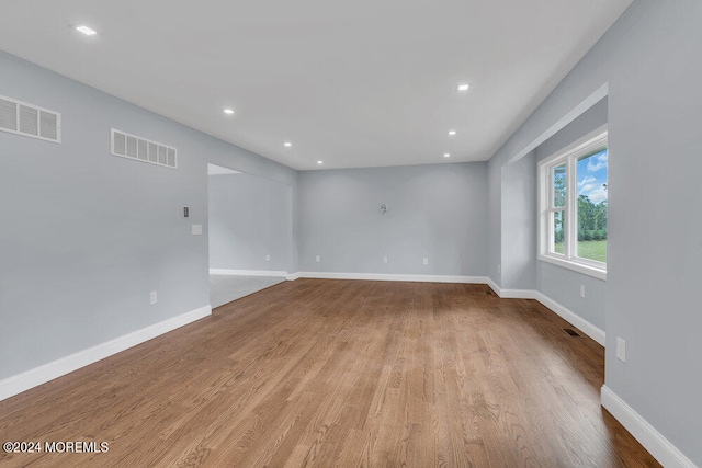 unfurnished room featuring light hardwood / wood-style flooring