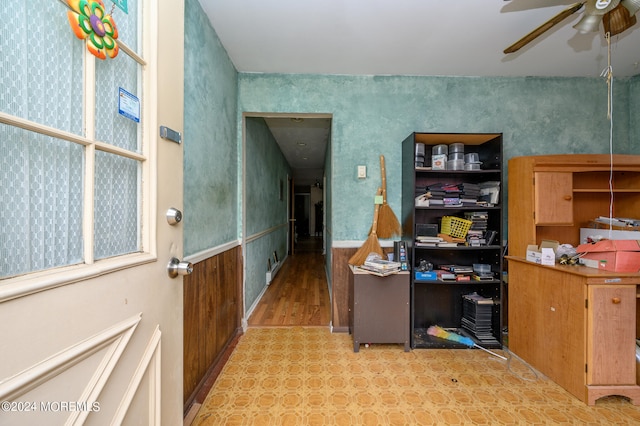 office space with ceiling fan and light hardwood / wood-style flooring