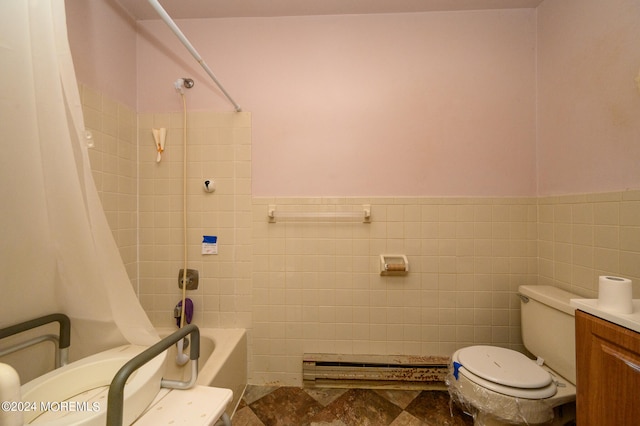 full bathroom with tile walls, a baseboard radiator, shower / tub combo, vanity, and toilet