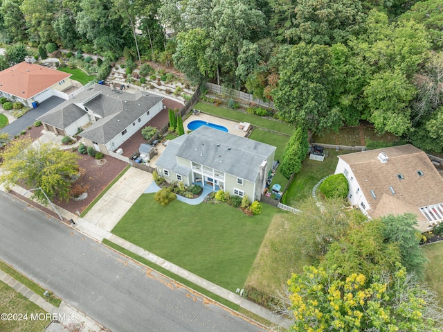 birds eye view of property with a residential view