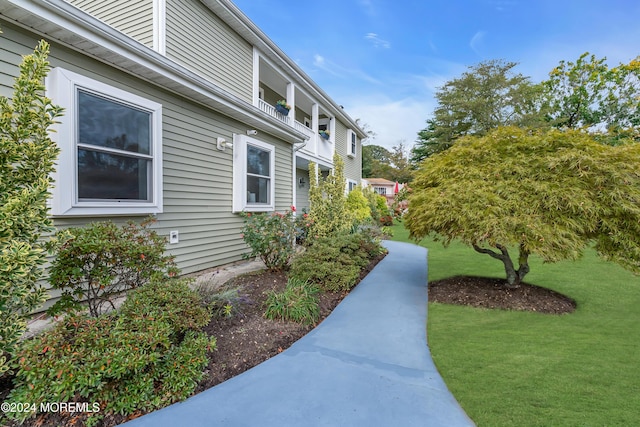 exterior space with a lawn