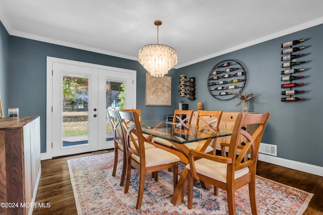 dining room with crown molding, baseboards, french doors, an inviting chandelier, and dark wood-style flooring