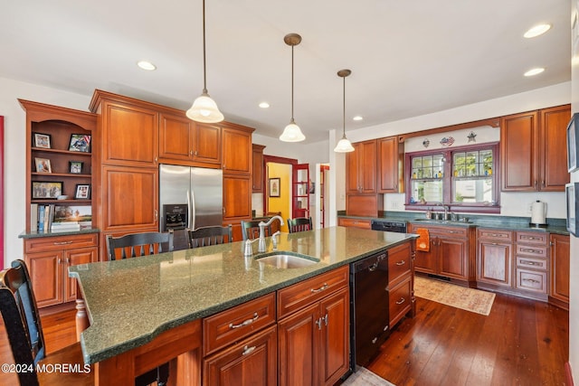 kitchen with open shelves, stainless steel fridge, dishwasher, a sink, and an island with sink