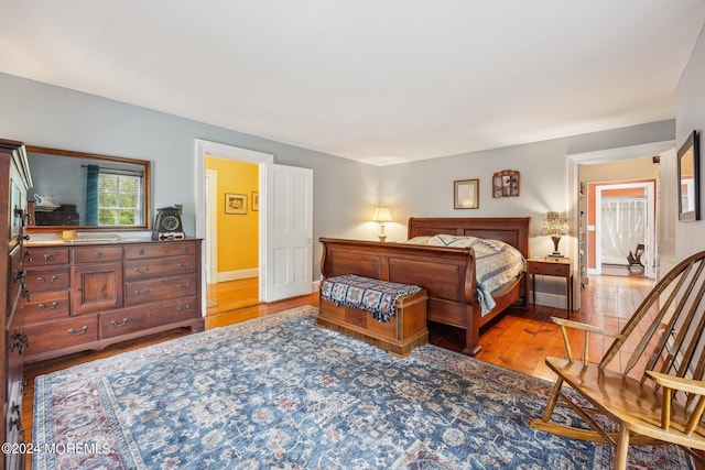 bedroom with light wood-style flooring
