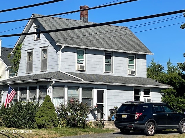 view of front of property with cooling unit