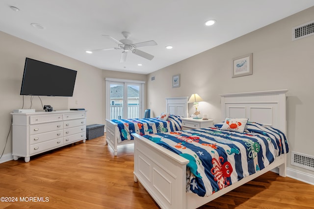 bedroom with access to exterior, ceiling fan, and light hardwood / wood-style flooring