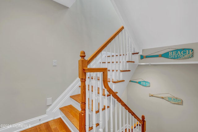 stairway with wood-type flooring