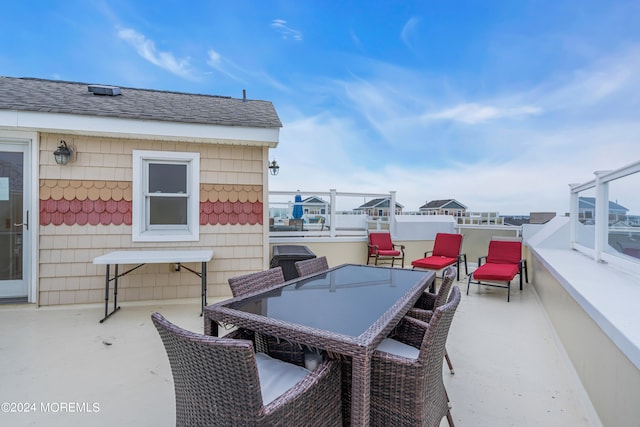 view of patio / terrace with a balcony