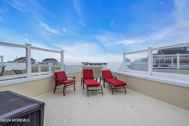 view of patio / terrace with a balcony