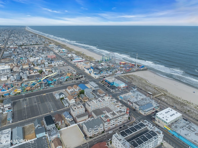 bird's eye view with a beach view and a water view