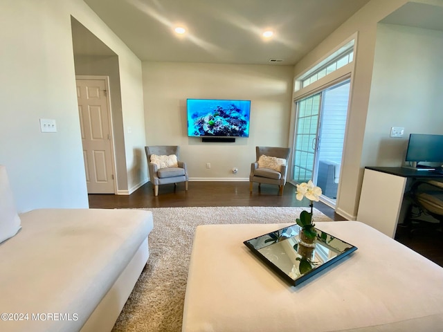 living room featuring dark hardwood / wood-style floors