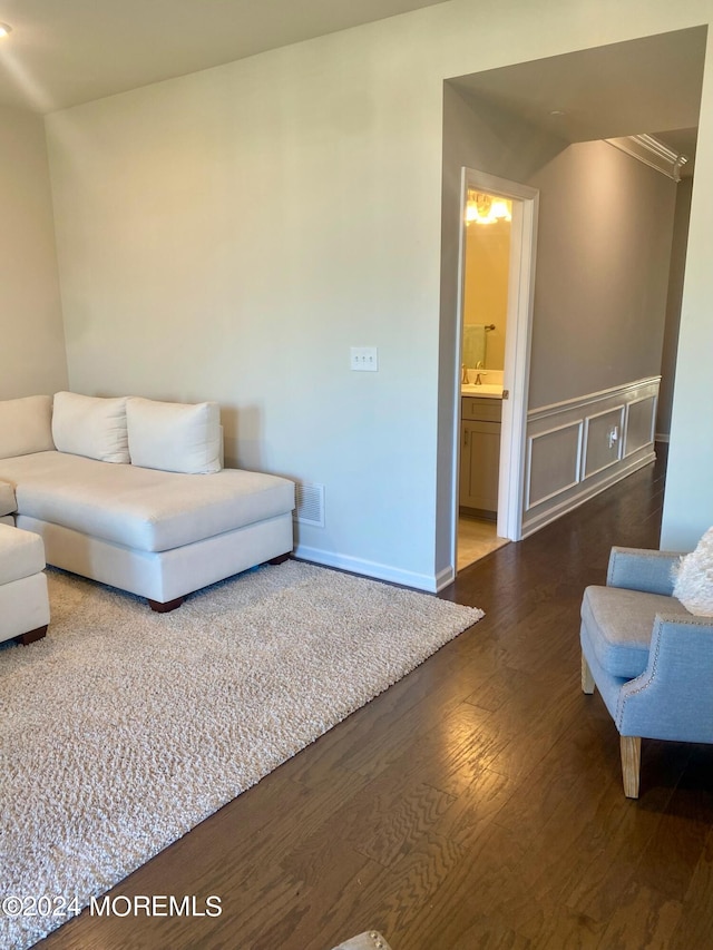 living room featuring dark hardwood / wood-style floors