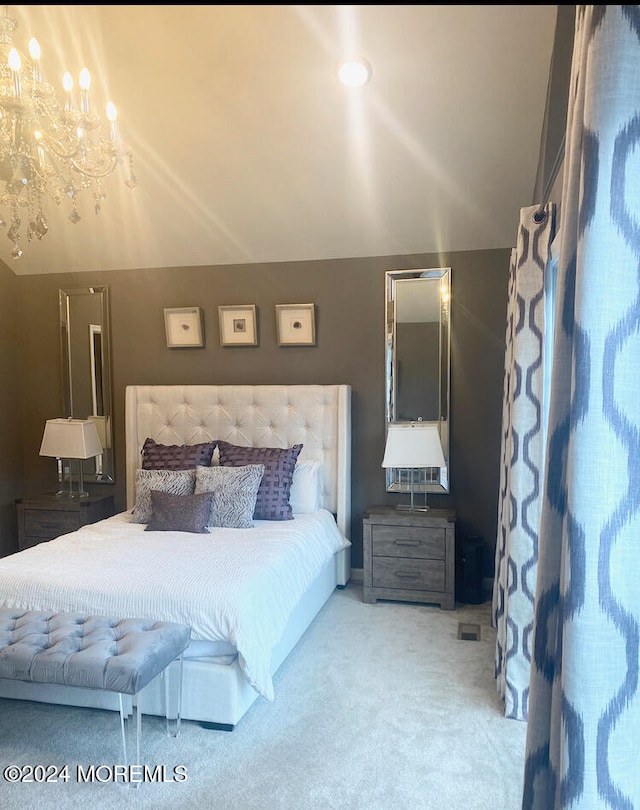 carpeted bedroom featuring lofted ceiling