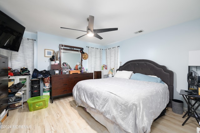 bedroom featuring ceiling fan and light hardwood / wood-style flooring