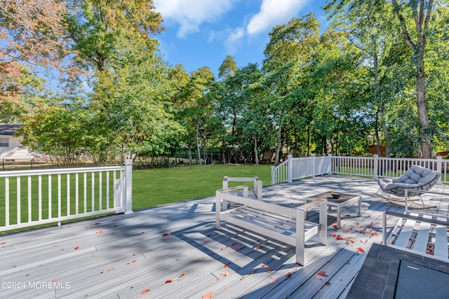 deck featuring a lawn