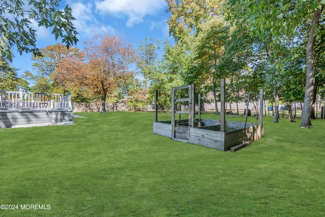 view of yard with a deck