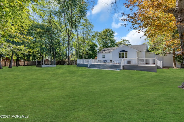 view of yard with a deck