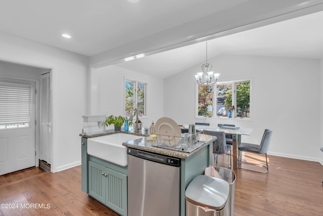 kitchen with decorative light fixtures, a healthy amount of sunlight, stainless steel dishwasher, and light wood-type flooring