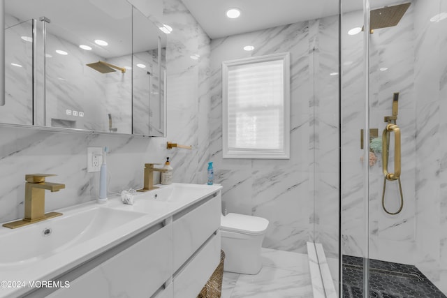 bathroom with toilet, walk in shower, vanity, and tile walls