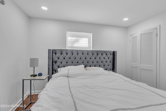 bedroom featuring hardwood / wood-style flooring