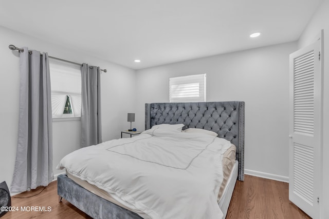 bedroom featuring hardwood / wood-style floors