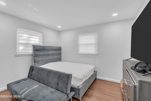 bedroom featuring light hardwood / wood-style floors